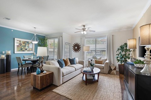 a living room with a couch and a table